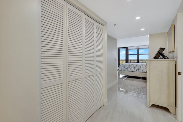 4600 S Ocean Blvd Unit 1003, Highland Beach, FL 33487 - bedroom featuring a closet, baseboards, and recessed lighting