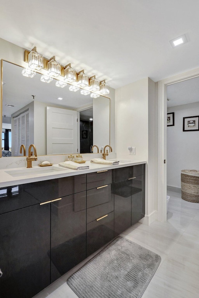 4600 S Ocean Blvd Unit 1003, Highland Beach, FL 33487 - full bath with double vanity and baseboards