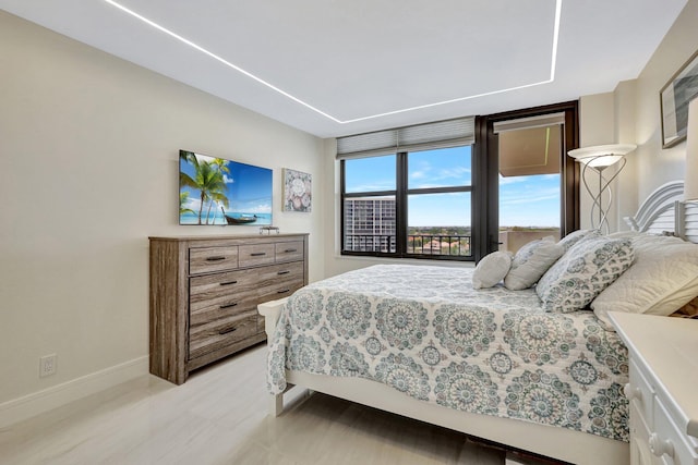 bedroom with baseboards