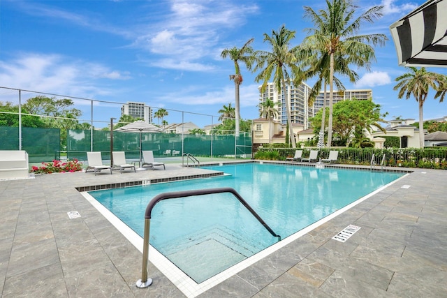 4600 S Ocean Blvd Unit 1003, Highland Beach, FL 33487 - community pool featuring a patio area