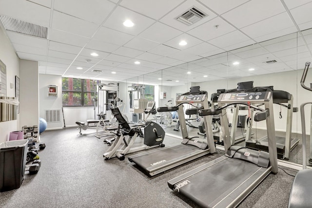 4600 S Ocean Blvd Unit 1003, Highland Beach, FL 33487 - gym featuring baseboards, recessed lighting, and a drop ceiling