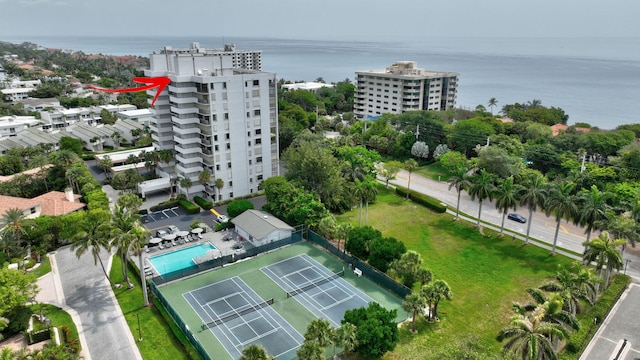 birds eye view of property featuring a water view