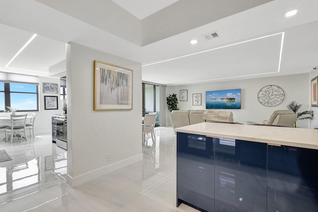 4600 S Ocean Blvd Unit 1003, Highland Beach, FL 33487 - kitchen with open floor plan, light countertops, baseboards, modern cabinets, and recessed lighting