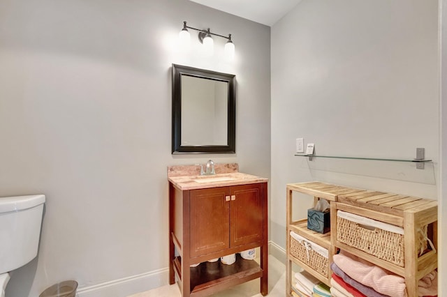 14612 Canalview Dr Unit B, Delray Beach, FL 33484 - half bathroom with baseboards, vanity, and toilet