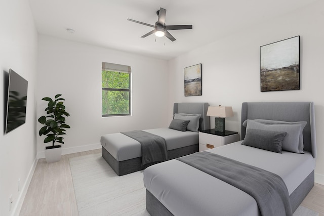4657 SW Keats St, Port Saint Lucie, FL 34953 - bedroom with light wood-style floors and ceiling fan