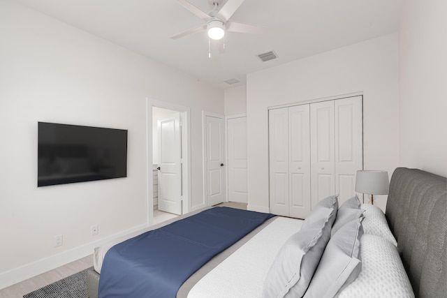 4657 SW Keats St, Port Saint Lucie, FL 34953 - bedroom with wood finished floors, ceiling fan, and a closet