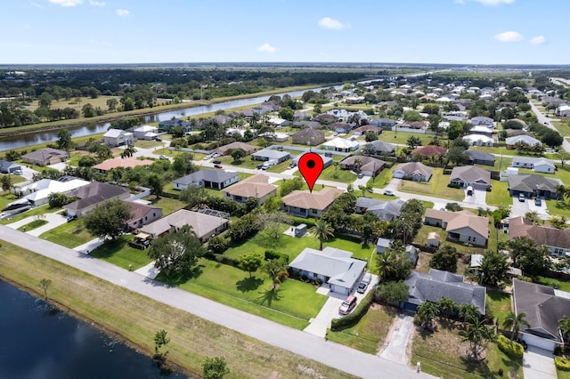 4657 SW Keats St, Port Saint Lucie, FL 34953 - view of property location featuring a large body of water and nearby suburban area