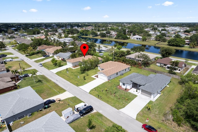 4657 SW Keats St, Port Saint Lucie, FL 34953 - aerial perspective of suburban area with a nearby body of water