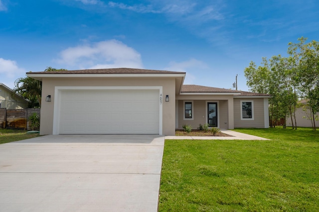 4657 SW Keats St, Port Saint Lucie, FL 34953 - view of front of home featuring concrete driveway, an attached garage, a front lawn, and stucco siding