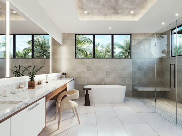 305 Grove Pl, Delray Beach, FL 33444 - full bath featuring a tray ceiling, a freestanding tub, double vanity, a shower stall, and recessed lighting