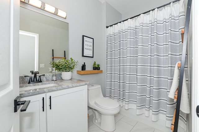 full bath with tile patterned flooring, shower / bath combo with shower curtain, toilet, and vanity