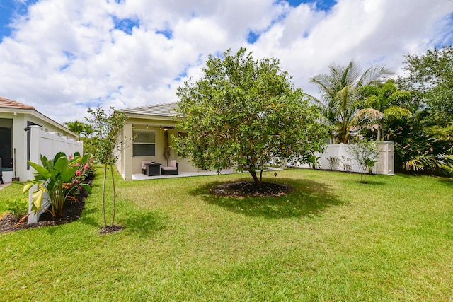 view of yard with fence