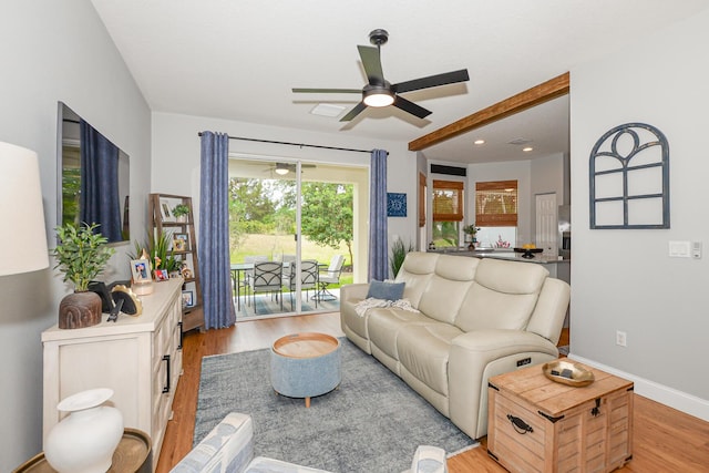 living room with recessed lighting, light wood finished floors, ceiling fan, and baseboards