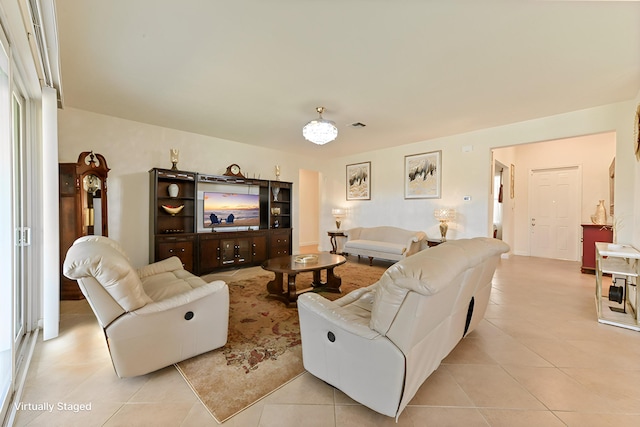 7384 NW Greenspring St, Port Saint Lucie, FL 34987 - living area with light tile patterned floors