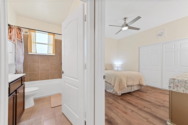 7384 NW Greenspring St, Port Saint Lucie, FL 34987 - bedroom with a closet, a ceiling fan, and light tile patterned floors
