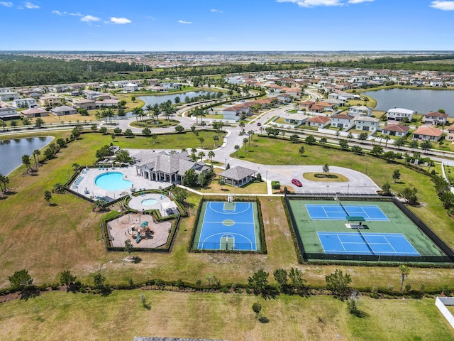7384 NW Greenspring St, Port Saint Lucie, FL 34987 - aerial perspective of suburban area with a nearby body of water and a pool area