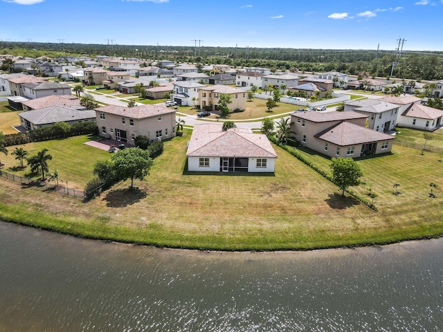 7384 NW Greenspring St, Port Saint Lucie, FL 34987 - aerial view of residential area with a nearby body of water