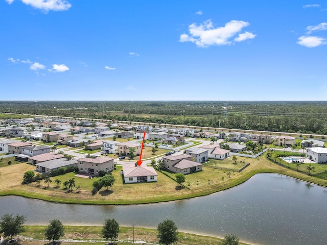 7384 NW Greenspring St, Port Saint Lucie, FL 34987 - aerial view of residential area featuring a large body of water