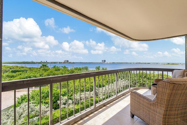 5380 N Ocean Dr Unit 5A, Riviera Beach, FL 33404 - kitchen featuring a sink, stainless steel appliances, white cabinetry, wine cooler, and visible vents