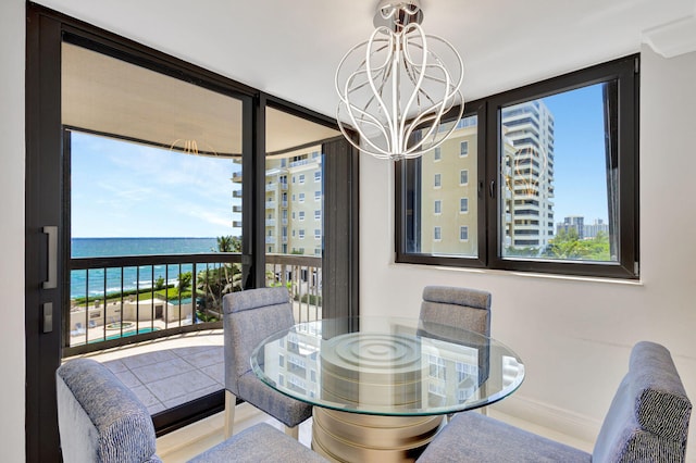 5380 N Ocean Dr Unit 5A, Riviera Beach, FL 33404 - bedroom featuring crown molding, baseboards, light tile patterned flooring, and visible vents