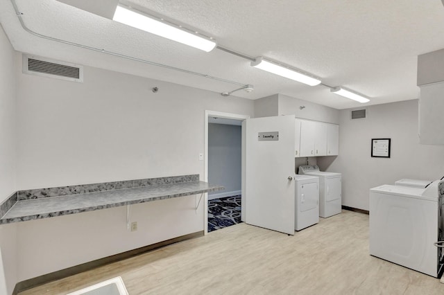 5380 N Ocean Dr Unit 5A, Riviera Beach, FL 33404 - kitchen with visible vents, ornamental molding, white cabinets, a sink, and stainless steel appliances