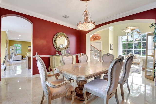 8841 Cobblestone Point Cir, Boynton Beach, FL 33472 - dining room featuring arched walkways, plenty of natural light, ornamental molding, and marble finish floor
