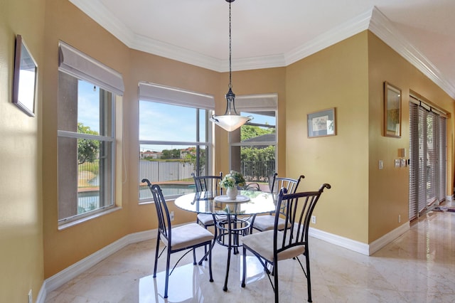 8841 Cobblestone Point Cir, Boynton Beach, FL 33472 - dining space featuring baseboards, ornamental molding, and plenty of natural light