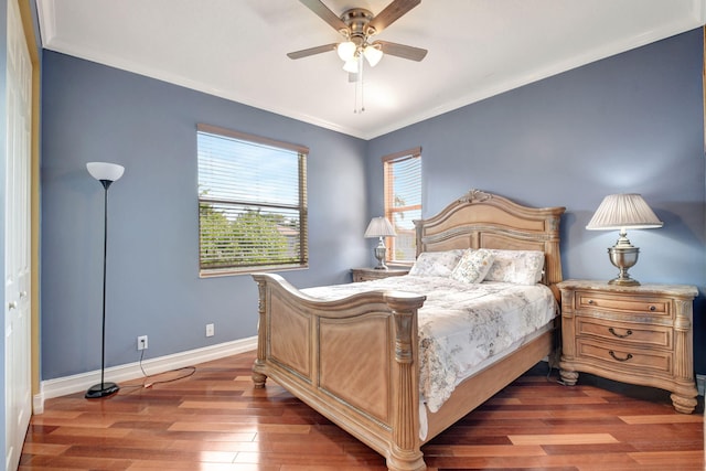 8841 Cobblestone Point Cir, Boynton Beach, FL 33472 - bedroom with crown molding, baseboards, ceiling fan, and dark wood-style floors