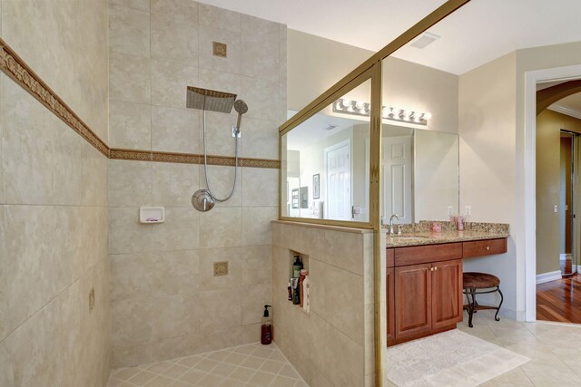 8841 Cobblestone Point Cir, Boynton Beach, FL 33472 - bathroom featuring tile patterned flooring, vanity, and tiled shower