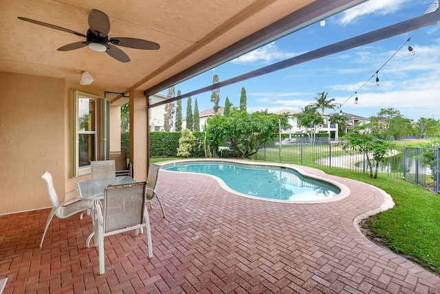 8841 Cobblestone Point Cir, Boynton Beach, FL 33472 - view of swimming pool with a fenced in pool, a fenced backyard, a ceiling fan, and a patio area