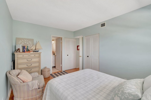 1910 S Ocean Blvd Unit 338, Delray Beach, FL 33483 - bedroom featuring visible vents and light wood-style flooring