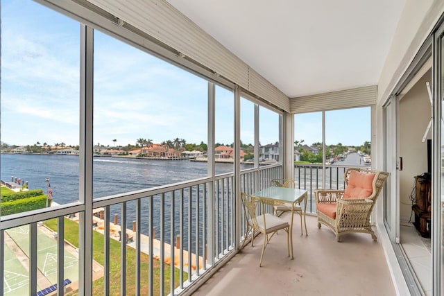 1910 S Ocean Blvd Unit 338, Delray Beach, FL 33483 - sunroom featuring a water view