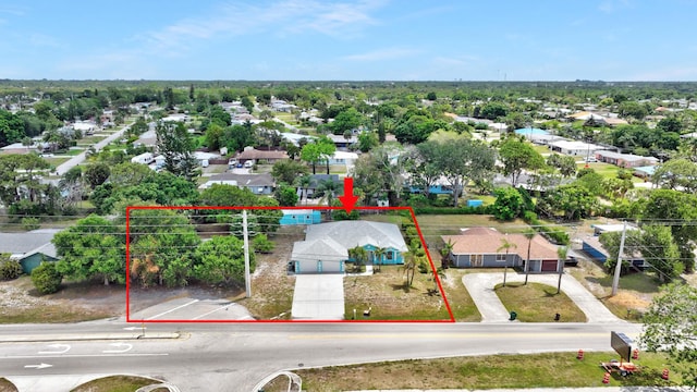 189 SE Floresta Dr, Port Saint Lucie, FL 34983 - aerial view of residential area with property parcel outlined