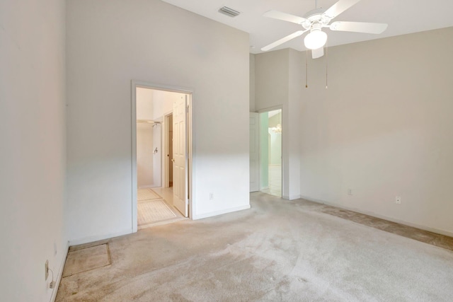 13006 Hampton Lakes Cir, Boynton Beach, FL 33436 - carpeted spare room featuring ceiling fan, baseboards, and a high ceiling