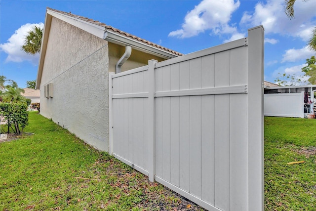 13006 Hampton Lakes Cir, Boynton Beach, FL 33436 - view of side of home with a yard and stucco siding