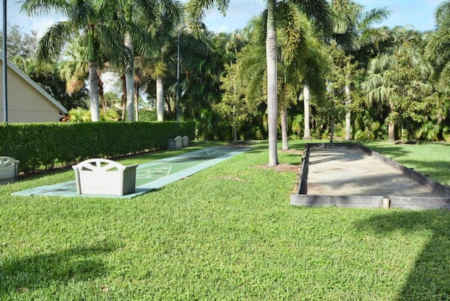 13006 Hampton Lakes Cir, Boynton Beach, FL 33436 - view of community with shuffleboard, a yard, and a bocce ball area