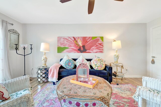 2971 SE Morningside Blvd, Port Saint Lucie, FL 34952 - living area with baseboards, a ceiling fan, and wood finished floors
