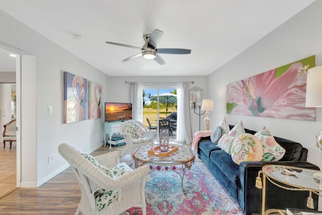 2971 SE Morningside Blvd, Port Saint Lucie, FL 34952 - living area featuring baseboards, ceiling fan, and wood finished floors