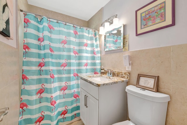 2971 SE Morningside Blvd, Port Saint Lucie, FL 34952 - bathroom featuring vanity, toilet, curtained shower, and tile walls