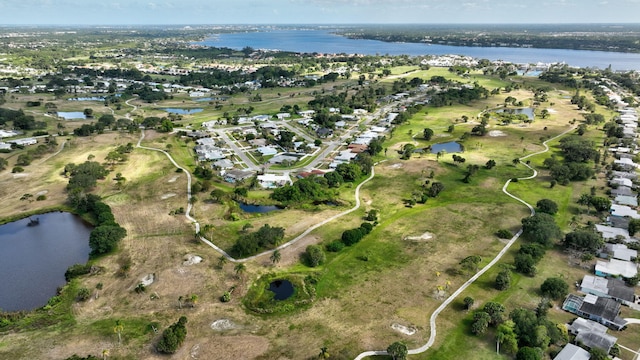 2971 SE Morningside Blvd, Port Saint Lucie, FL 34952 - birds eye view of property featuring a water view and a residential view
