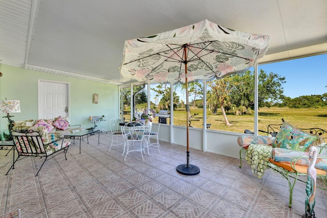 2971 SE Morningside Blvd, Port Saint Lucie, FL 34952 - sunroom / solarium featuring a wealth of natural light and outdoor dining space