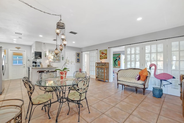 2971 SE Morningside Blvd, Port Saint Lucie, FL 34952 - dining room featuring recessed lighting, visible vents, and light tile patterned floors