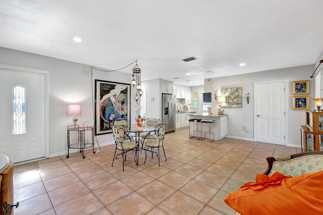 2971 SE Morningside Blvd, Port Saint Lucie, FL 34952 - dining area featuring light tile patterned floors, baseboards, recessed lighting, and visible vents