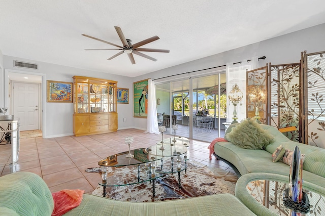 2971 SE Morningside Blvd, Port Saint Lucie, FL 34952 - tiled living room with baseboards, a ceiling fan, and visible vents