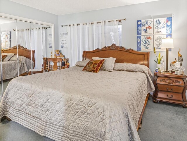 216 Sheffield I Unit 216, West Palm Beach, FL 33417 - carpeted bedroom featuring a closet