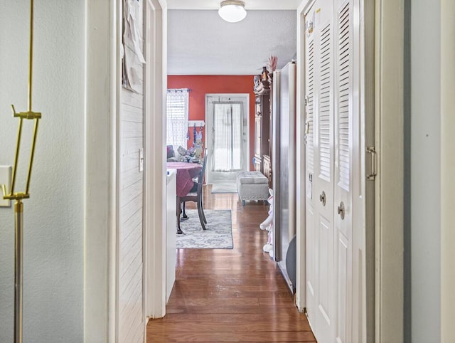 216 Sheffield I Unit 216, West Palm Beach, FL 33417 - hallway featuring wood finished floors