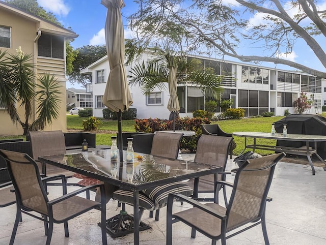 216 Sheffield I Unit 216, West Palm Beach, FL 33417 - view of patio with outdoor dining space