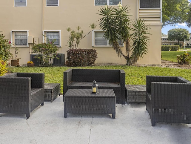 216 Sheffield I Unit 216, West Palm Beach, FL 33417 - view of patio featuring an outdoor living space and central AC