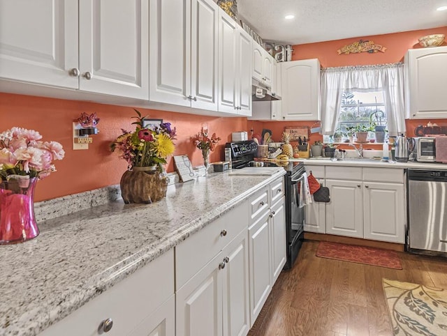 216 Sheffield I Unit 216, West Palm Beach, FL 33417 - kitchen featuring range with electric cooktop, stainless steel dishwasher, white cabinetry, under cabinet range hood, and dark wood finished floors
