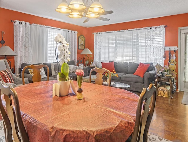 216 Sheffield I Unit 216, West Palm Beach, FL 33417 - dining area with wood finished floors and a chandelier